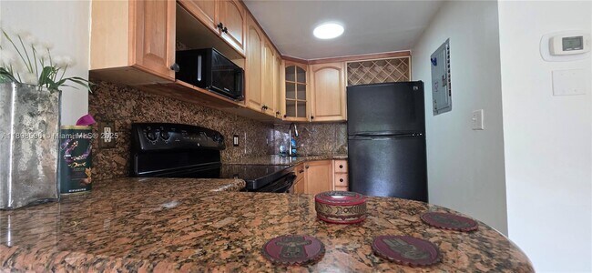 1650 NE 115th St unit 310, Miami, FL 33181 - photo 7