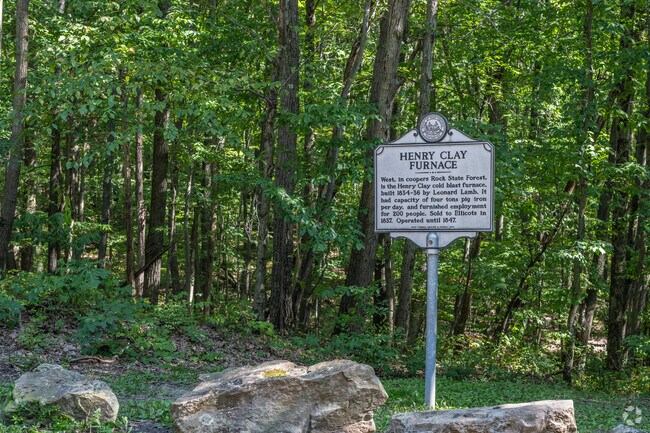 Visitors of Coopers Rock Forest walk the trail to the old Henry Clay Furnace near Cheat Lake.