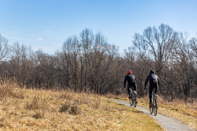 Cyclists enjoy White Clay Creek Preserve near New London Township on sunny trail rides.