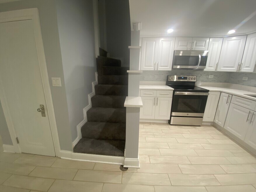 Front entrance and part of Kitchen