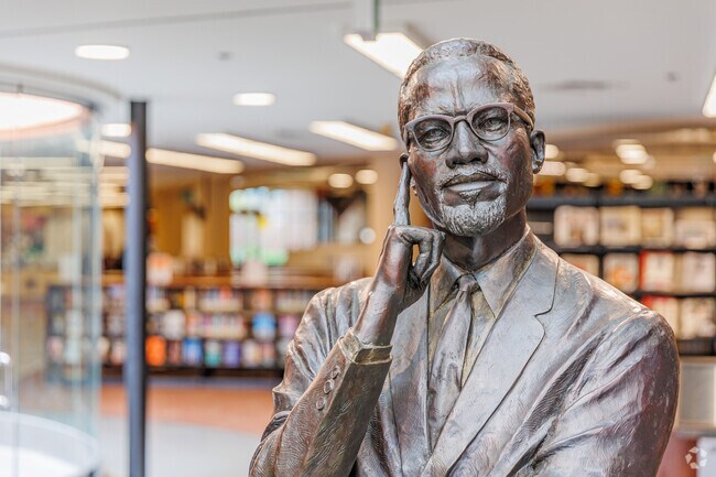 A Malcolm X statue welcomes visitors to the Malcolm X Branch Library in Emerald Hills.