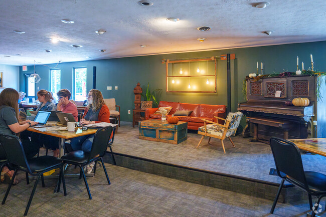 Take care of work tasks at Sacred Grounds Reclaimed and enjoy good food and coffee near Sawmill.