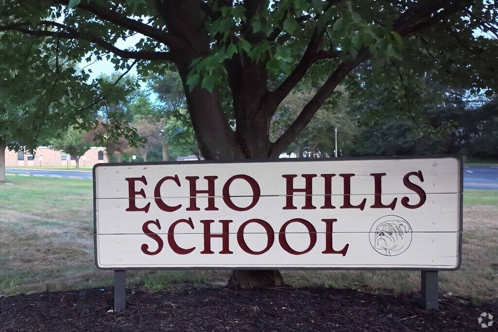 Echo Hills Elementary School sign welcomes students, faculty, and parents.
