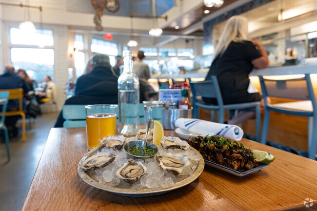 Riviera Circle commuters stop for happy hour treats at Hog Island Oyster Co.