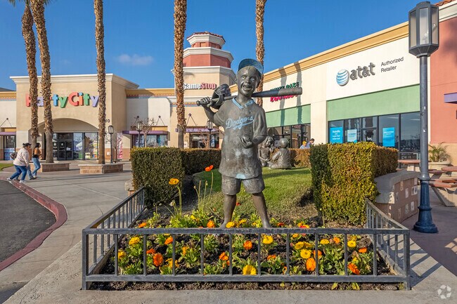 Flowers bloom on a hot day at the Northwest Promenade near Greenacres.