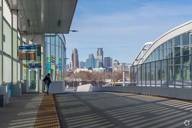 Lake Street Station is a major bus stop with a view of the skyline.