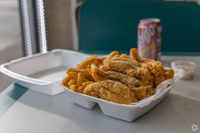 Grab a delicious fish dinner at Sharks Fish and Chicken in the Hampton Heights neighborhood.