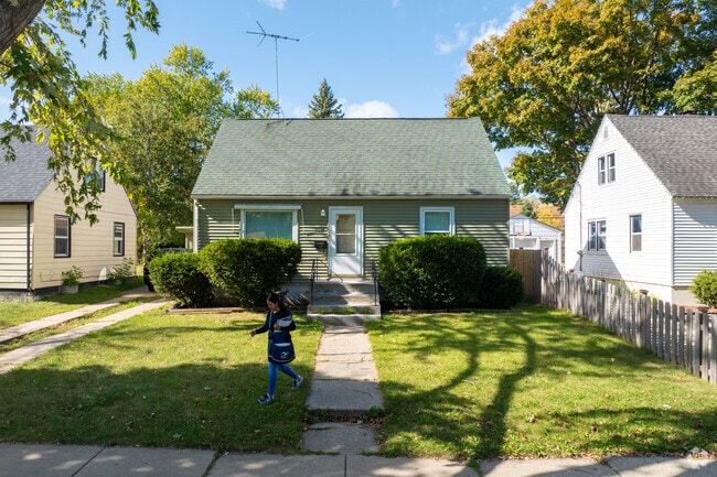Postal workers in Joanna go by foot and greet residents while delivering mail.