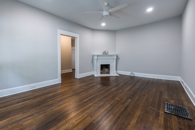 Tall ceilings and decorative fireplace