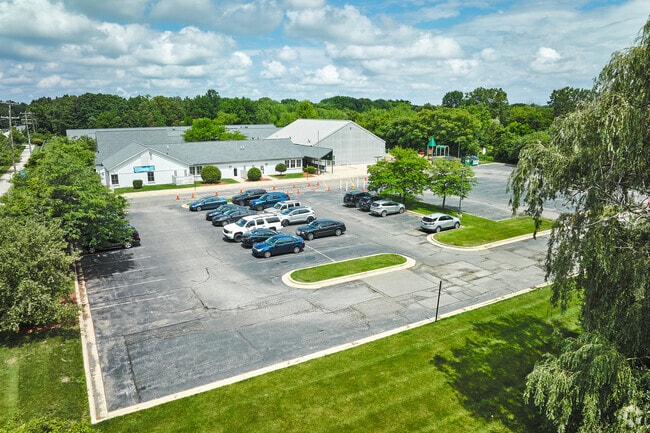 The sizable main lot at Fortis Academy also has run-off parking for school events.