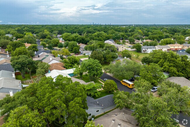 A birds-eye view of the green and quant streets of Maple Run.