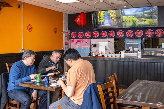 Diners enjoy lunch at Tasty Kitchen, which offers Chinese and Japanese cuisine.