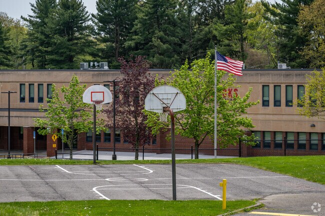 Students at Rhema Christian School can play basketball on the small court by the school.