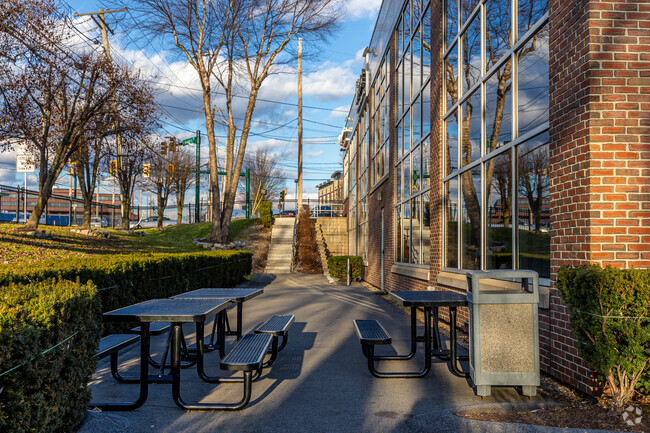 Fusion Academy Newton has a small patio with picnic tables.