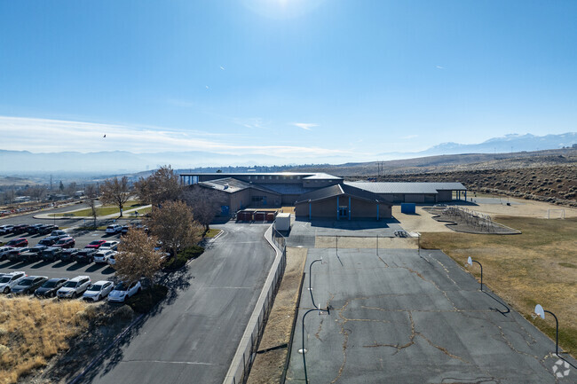 An aerial view of the city of Reno behind Lois Allen Elementary School.