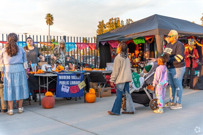 Rainbow Ridge residents take their kids to the celebrations during Día de los Muertos.