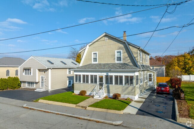 A Dutch Colonial home adds to the diversity of homes in the Manville-Albion neighborhood, RI.