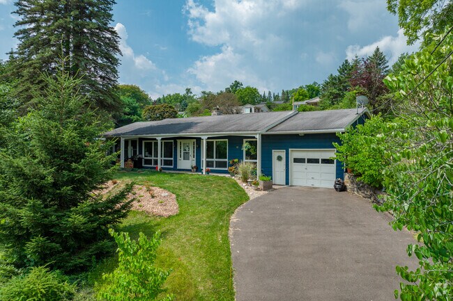 Homes in West Hill often have many trees around them, offering homeowners privacy.