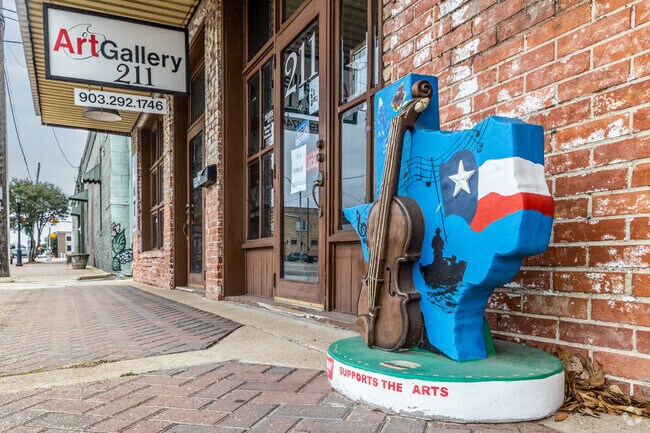 Throughout Athens, locals decorate sidewalks with artistic touches.
