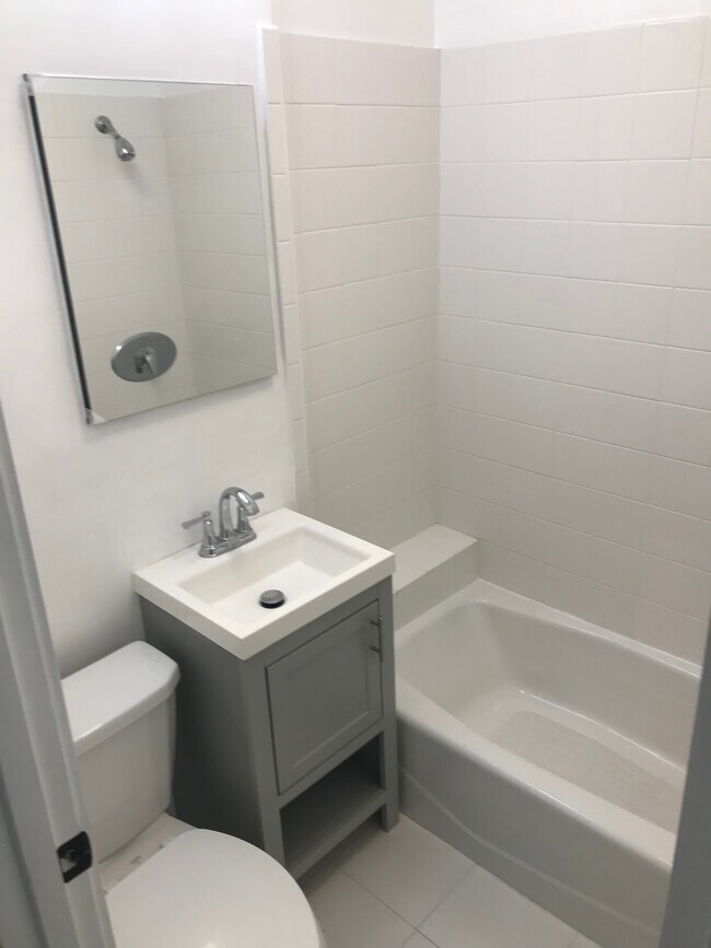 Bath with shower