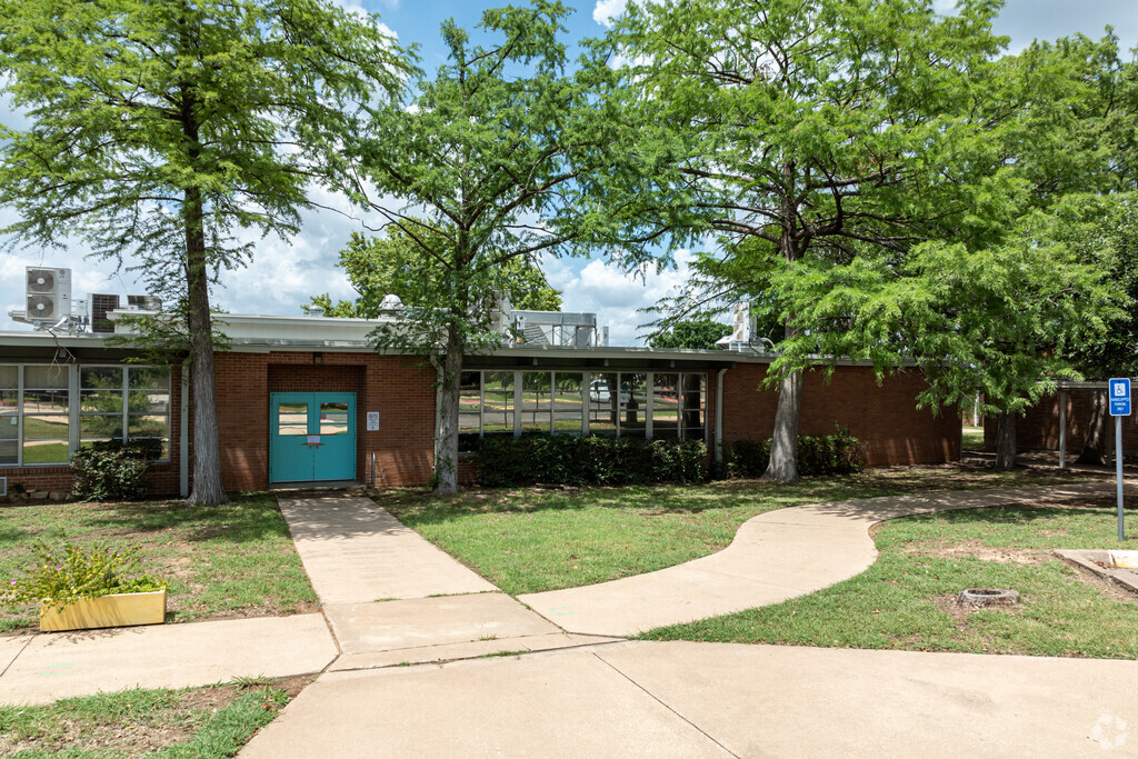 Cunningham Elementary School is directly accessible via Menchaca Road.