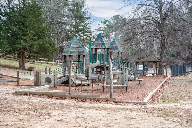 Students burn off energy on the playground at Bay Farm Montessori Academy in Duxbury.