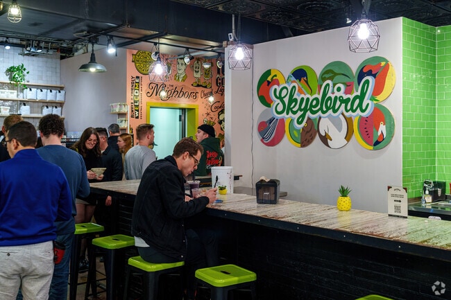 An Audubon Park resident enjoys lunch at Skyebird in the East End Market.