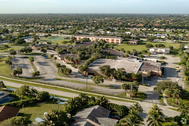 Aerial view of the large campus of Indian Pines Elementary School in Lantana, FL.