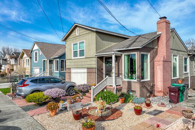 A row of one-story bungalows with small front gardens are typical in Dartmouth.