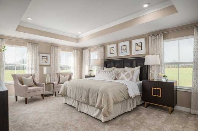 You deserve this spacious owner's suite complete with a luxurious en-suite bathroom and walk-in closet! Schedule your visit today.