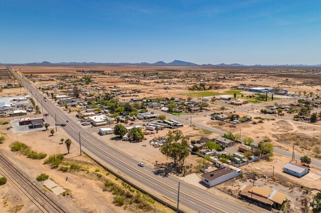 Aguila is a small, rural community northwest of Phoenix, surrounded by expansive desert landscapes and distant mountain views.