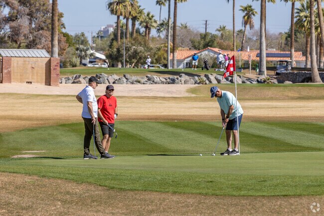 Catch a mid-day round of golf with your friends at Phoenix’s Encanto 18 Golf Course.