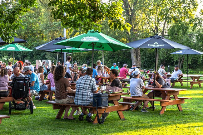 Summer evenings bring families together at Hartland Beer Garden near Merton.