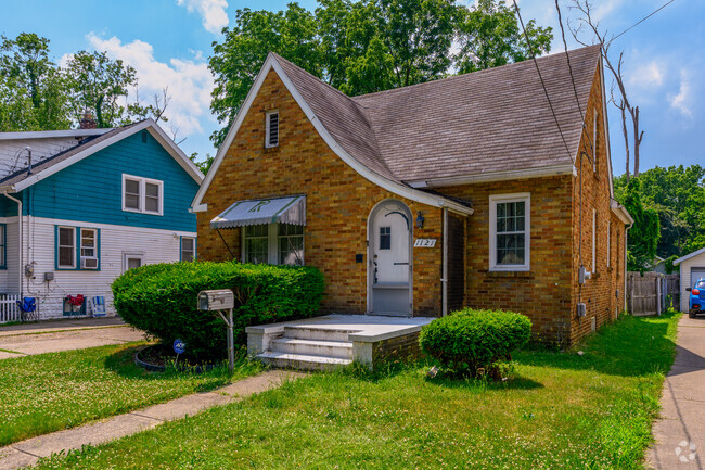A lovely brick Tudor inspired home sits across from LaCrone Park in Northside.