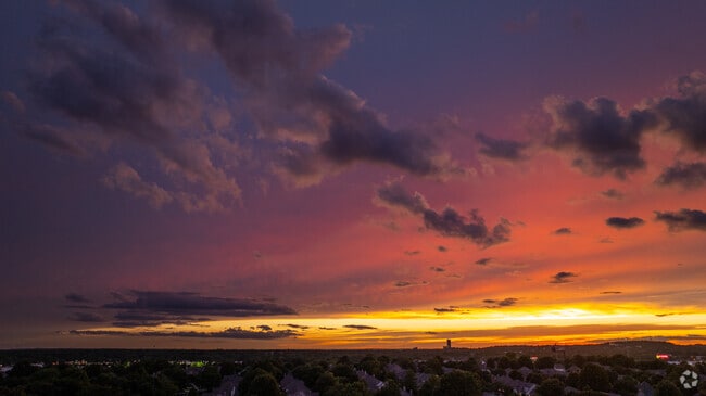 Beautiful and vibrant Tulsa sunsets wash the homes of Knollwood Estates in pink twilight.
