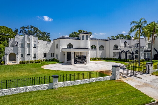 Large Spanish Mission homes add a wow factor to Pasadena On The Gulf neighborhood.