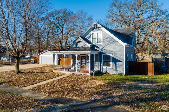 An older farm house in Gentry shows off a fresh remodel.