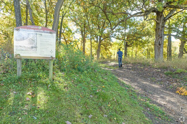 Long Lake Park near Remington Trails features scenic trails and peaceful lake views.
