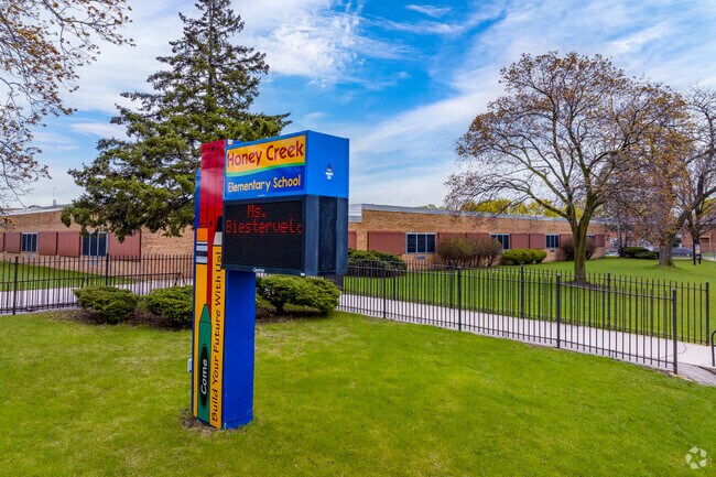 The Entry and sign of Honey Creek Elementary School in the Root Creek neighborhood.