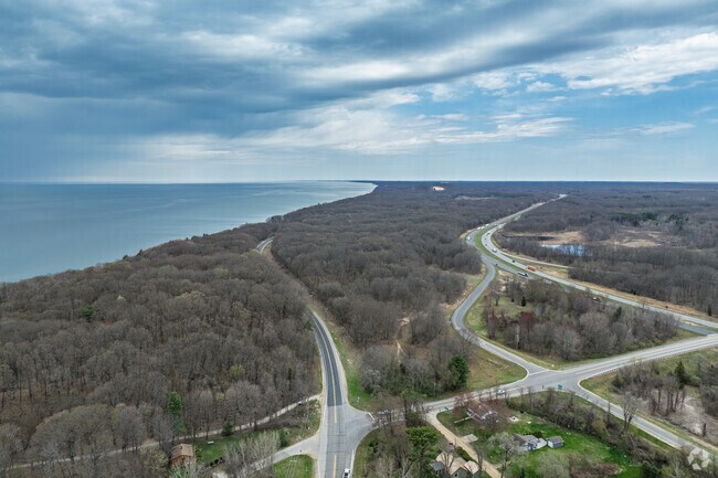 Lake Michigan Beach is a wooded lakefront community with easy access to the interstate.