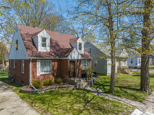 Cape Cod-style home with dormer windows in the Colonial Village neighborhood