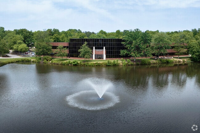 A beautiful office park situated on a lake in Stony Point neighborhood.