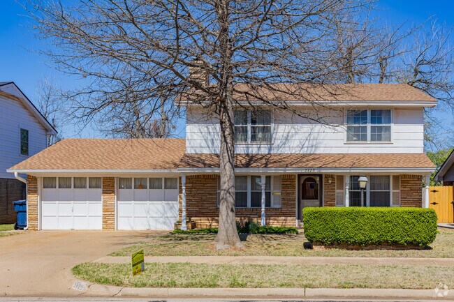 Well-maintained 1960s prairie and colonial-style homes line the Meadowcliff neighborhood.