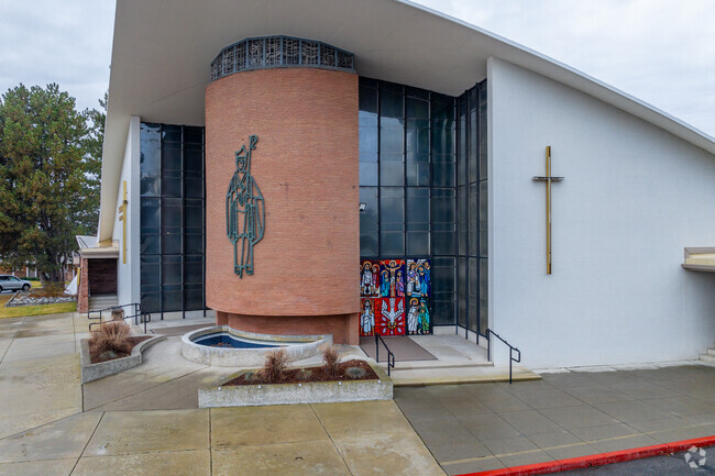 Saint Charles Catholic School features a large church in front.
