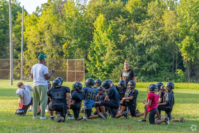 Young footballers listen to their coach at Garman Park, located near Ravina Park.