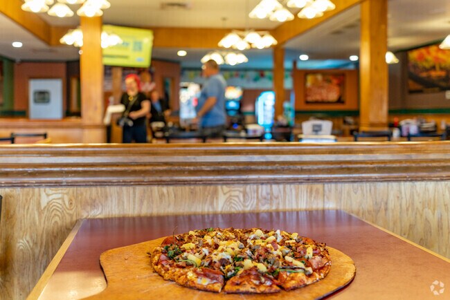 Savor every slice at Abby's Legendary Pizza, a West Harvard favorite.