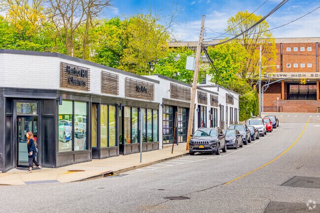 A row of shops sits right outside Roslyn High School in Roslyn Heights.