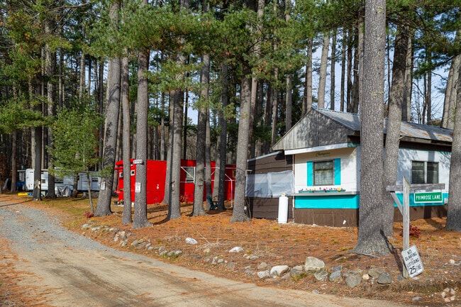 Mobile homes serving as part-time vacation spots line the west side of Sacandaga Lake in Day.