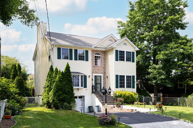 New modern homes can be found in some of the quiet back streets of West End, New York.