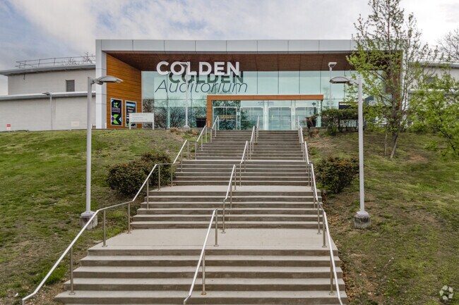 New York University - Queens College Golden Auditorium is located in Pomonok.